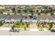 Aerial view of a house with solar panels and neighborhood at 8324 Ludington Cir, Orlando, FL 32836