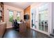 Spacious home office with wood features and built-in shelving at 8324 Ludington Cir, Orlando, FL 32836