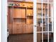 Built-in shelving and spacious home office with wood finishes at 8324 Ludington Cir, Orlando, FL 32836