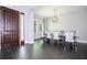 Modern dining room with elegant table and chairs at 8324 Ludington Cir, Orlando, FL 32836