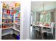 Well-organized pantry with ample shelving for storage at 8324 Ludington Cir, Orlando, FL 32836