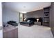 Spacious main bedroom with large bed, modern wall decor, and sitting area at 8324 Ludington Cir, Orlando, FL 32836
