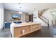 Open living area with contemporary furniture and built-in shelving at 8324 Ludington Cir, Orlando, FL 32836