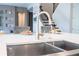 Modern kitchen sink with a pull-down faucet at 8324 Ludington Cir, Orlando, FL 32836