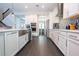 Bright kitchen with dark wood floors and open concept design at 8324 Ludington Cir, Orlando, FL 32836