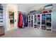 Bright walk-in closet with custom shelving and hanging space at 8324 Ludington Cir, Orlando, FL 32836