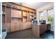 Home office with wood built-ins and desk at 8324 Ludington Cir, Orlando, FL 32836