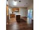Kitchen with an island, plenty of cabinets, and sliding doors at 1611 Sand Key Cir, Oviedo, FL 32765