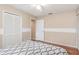 Bedroom with hardwood floors and ample closet space at 1611 Sand Key Cir, Oviedo, FL 32765