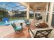 Screened pool and spa with patio furniture at 319 Morning View Dr, Winter Garden, FL 34787