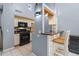 Modern kitchen with black appliances and granite countertops at 101 N Hill Ave # 4, Deland, FL 32724