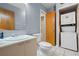 Bathroom includes toilet, sink, and stackable washer/dryer at 101 N Hill Ave # 4, Deland, FL 32724
