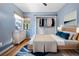 Bright bedroom with walk-in closet and hardwood floors at 101 N Hill Ave # 4, Deland, FL 32724