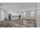 Modern kitchen with white cabinets, granite countertops, and island at 1402 Persimmon Ave, Sanford, FL 32771