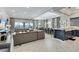Open floor plan encompassing living, dining, and kitchen areas at 415 Muirfield Loop, Reunion, FL 34747