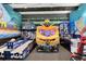Game room with various arcade games and air hockey at 415 Muirfield Loop, Reunion, FL 34747