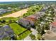 Luxury home with putting green, backing to golf course at 415 Muirfield Loop, Reunion, FL 34747