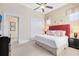 King-size bed, large windows and plenty of closet space at 415 Muirfield Loop, Reunion, FL 34747