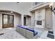 Relaxing courtyard with fireplace and comfortable seating at 415 Muirfield Loop, Reunion, FL 34747