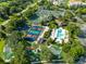 Tennis courts, pickleball, mini golf, community pool at 415 Muirfield Loop, Reunion, FL 34747