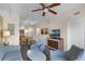 Living room with two armchairs, a sofa, and a coffee table at 12544 Floridays Resort Dr # 203-B, Orlando, FL 32821