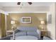 Living room with sofa, end tables, lamps and artwork at 12544 Floridays Resort Dr # 203-B, Orlando, FL 32821