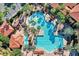 Large pool with plenty of lounge chairs at 12544 Floridays Resort Dr # 203-B, Orlando, FL 32821