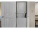 Stackable washer and dryer in a closet at 12544 Floridays Resort Dr # 203-B, Orlando, FL 32821