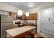 Modern kitchen with stainless steel appliances and granite countertops at 12544 Floridays Resort Dr # 203-B, Orlando, FL 32821