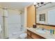 Bathroom with shower/tub combo, vanity, and mirror at 12544 Floridays Resort Dr # 203-B, Orlando, FL 32821