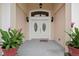Elegant double front doors with sidelights at 17279 Peggy Ave, Mount Dora, FL 32757