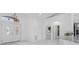 Spacious entryway with double doors and marble floors at 17279 Peggy Ave, Mount Dora, FL 32757