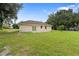 Spacious backyard with grassy area and home at 17279 Peggy Ave, Mount Dora, FL 32757