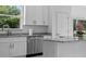 Modern kitchen with stainless steel appliances and granite countertops at 17279 Peggy Ave, Mount Dora, FL 32757