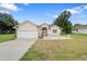 Beautiful one-story home with a large yard and a two-car garage at 17279 Peggy Ave, Mount Dora, FL 32757