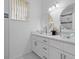 Updated bathroom with double sinks and glass vessel sinks at 17279 Peggy Ave, Mount Dora, FL 32757
