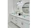 Updated bathroom with double sinks and glass vessel sinks at 17279 Peggy Ave, Mount Dora, FL 32757