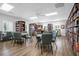 Community library with bookshelves and seating at 21242 Braveheart Dr, Leesburg, FL 34748