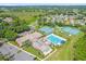 Community pool and tennis courts at 21242 Braveheart Dr, Leesburg, FL 34748
