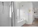 Bathroom with shower and bathtub at 21242 Braveheart Dr, Leesburg, FL 34748