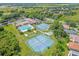 Community features include tennis courts, pool, and clubhouse at 21242 Braveheart Dr, Leesburg, FL 34748