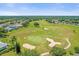 Aerial view of community and golf course at 21242 Braveheart Dr, Leesburg, FL 34748