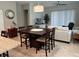 Casual dining area with table and chairs, adjacent to the kitchen at 1753 Flora Pass Pl, Kissimmee, FL 34747