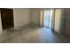 Bright living room with sliding doors leading to a patio at 525 Conway Rd # 201, Orlando, FL 32807