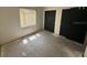 Spacious bedroom with two closets and neutral walls at 525 Conway Rd # 201, Orlando, FL 32807