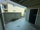 Private patio with storage and a view of the community at 525 Conway Rd # 201, Orlando, FL 32807