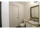 Simple bathroom with granite countertop and white vanity at 276 Tavestock Loop, Winter Springs, FL 32708