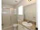 Bathroom with granite countertop and walk-in shower at 276 Tavestock Loop, Winter Springs, FL 32708