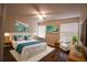 Spacious primary bedroom with plush bedding and ample natural light at 276 Tavestock Loop, Winter Springs, FL 32708