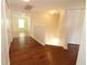 Upstairs hallway with hardwood floors and access to bedrooms at 276 Tavestock Loop, Winter Springs, FL 32708